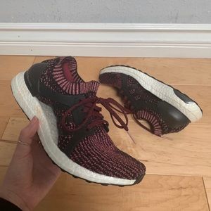 purple and black adidas ultra boost running shoes